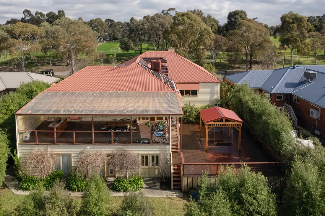 Aerial view of the completed home, deck and pergola in Doreen by MNA Builds